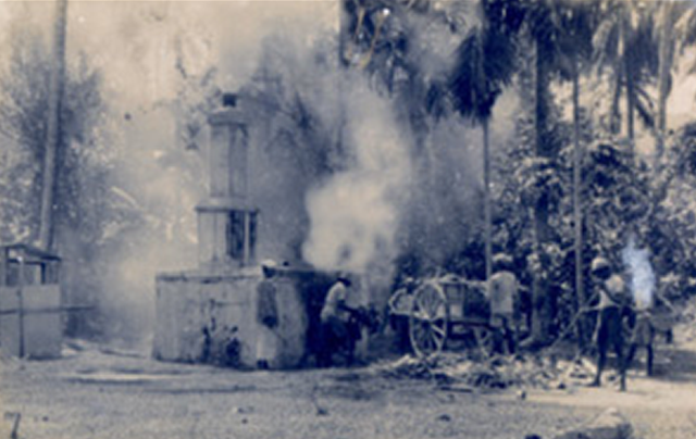 The rubber curing smokehouses that adorned every plantation were hot, filthy places in which to sweat away the day.